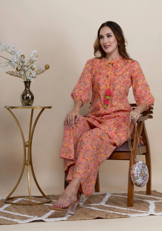 Peach Oriental Floral Printed Straight Pure Cotton Short Kurta With Bell Pants