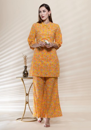 Orange Oriental Floral Printed Straight Pure Cotton Short Kurta With Bell Pants